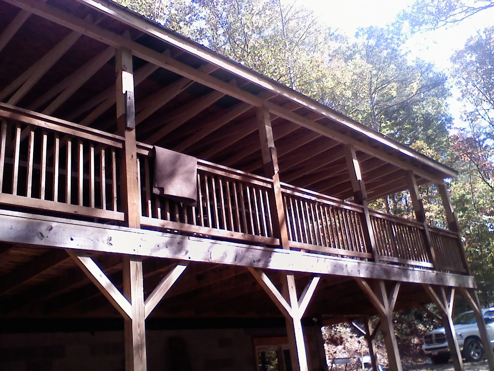 Timber framing under a new elevated porch and deck — Roof Leak Repair in Celina by Roofing Brothers